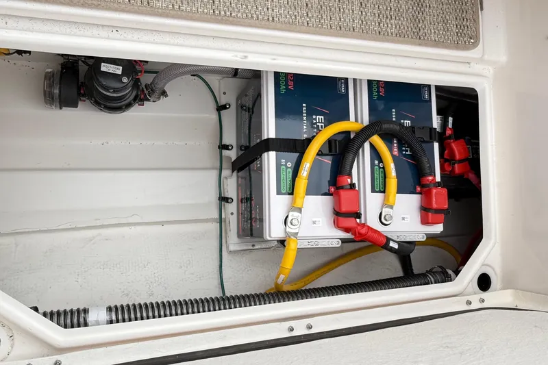 Slide: The Image of Battery compartment of 2026 Cutwater C-248 Coupe with wiring and components. - 55