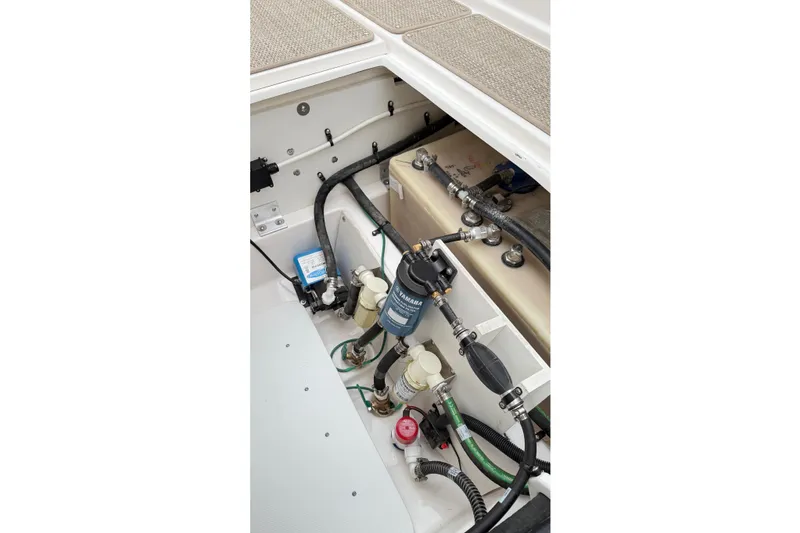 Slide: The Image of 2026 Cutwater C-248 Coupe engine compartment with fuel system and hoses. - 58