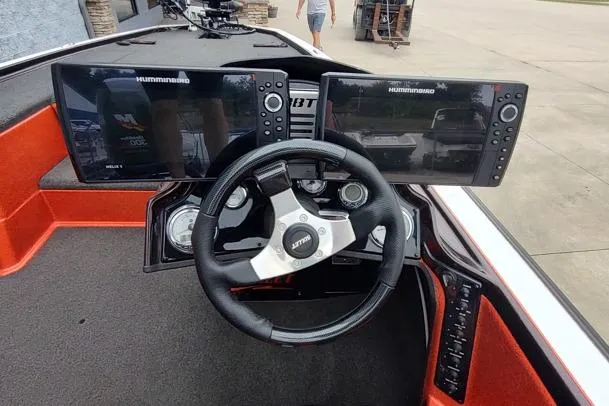 Slide: The Image of Steering console of 2016 Bullet 21XRD boat with dual Humminbird displays. - 8