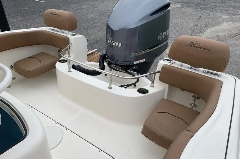 Slide: The Image of 2025 Pionee Sportfish 222 boat with Yamaha 250 engine, featuring tan seating. - 10