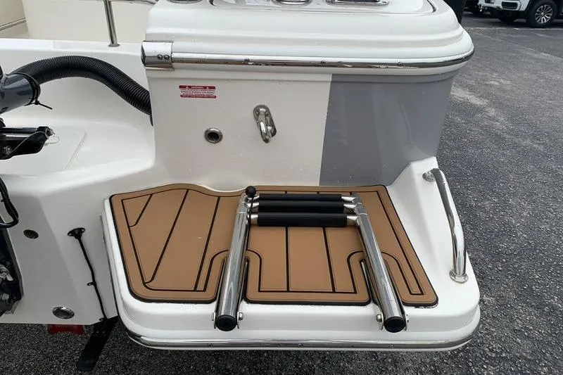 Slide: The Image of 2025 Pionee Sportfish 222 boat swim platform with ladder and non-slip surface. - 11