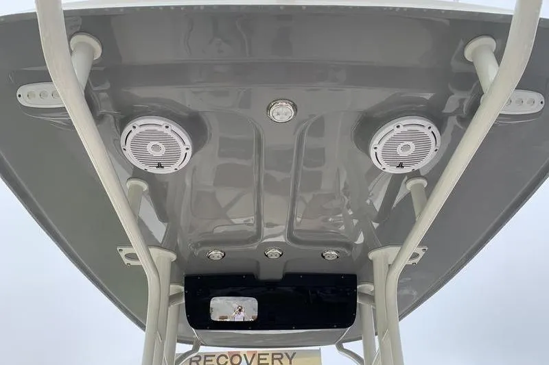 Slide: The Image of 2025 Pionee Sportfish 222 boat roof with speakers and lights. - 17