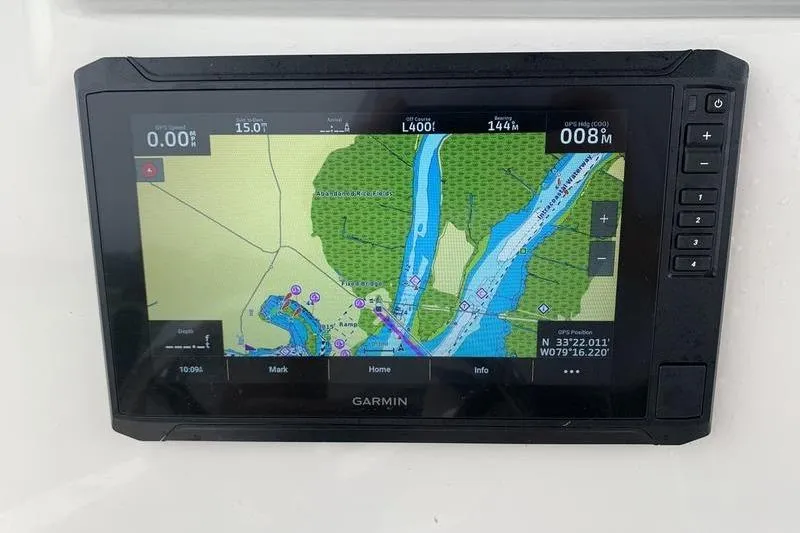 Slide: The Image of Garmin GPS display on 2025 Pionee Sportfish 222 boat, showing navigational map. - 23