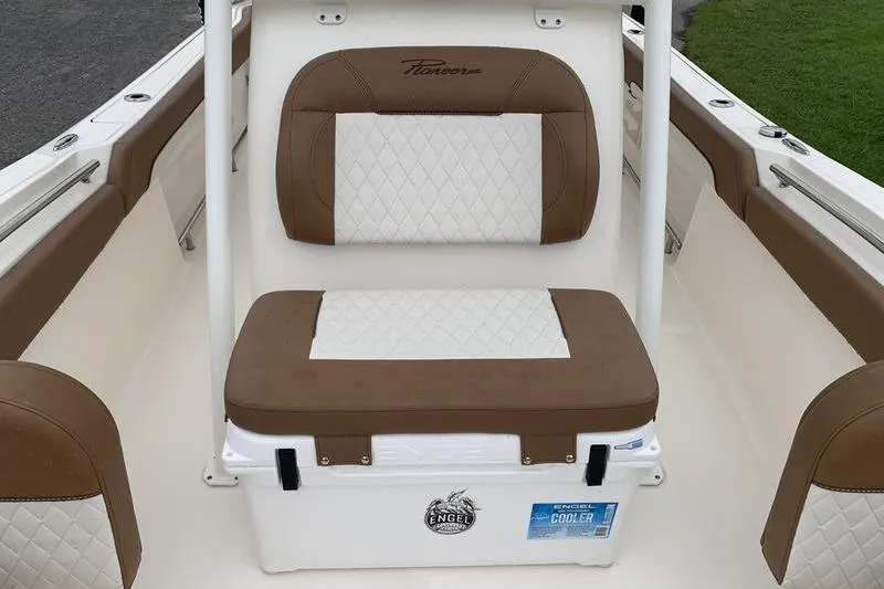 Slide: The Image of 2025 Pionee Sportfish 222 boat seat with Engel cooler, brown and white upholstery. - 32