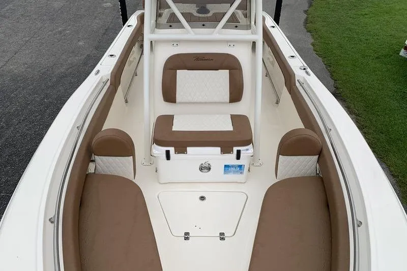 Slide: The Image of 2025 Pionee Sportfish 222 boat interior with brown and white seating. - 36
