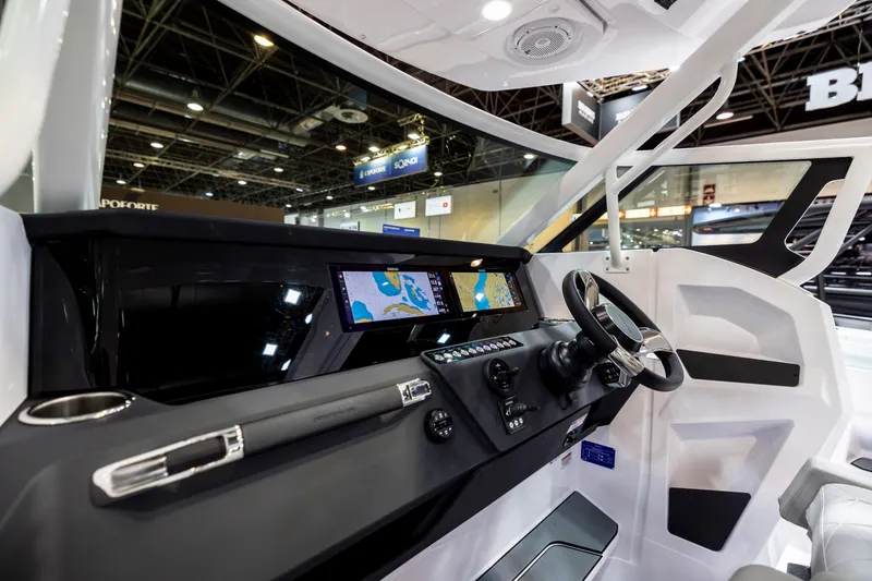 Slide: The Image of 2025 Axopar Sun-Top boat deck with sleek design and modern features. - 11