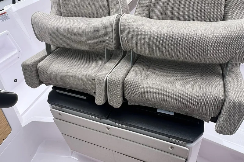 Slide: The Image of 2025 Axopar Sun-Top boat seats with gray upholstery and modern design. - 34