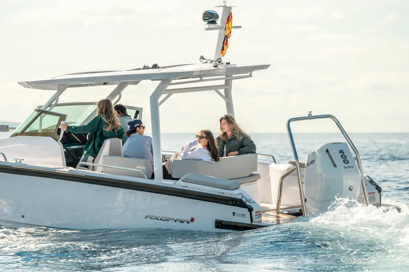 Slide: The Image of 2025 Axopar Sun-Top boat interior with modern seating and sleek design. - 4