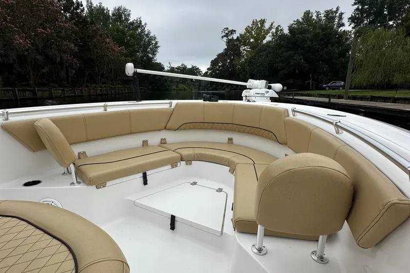 Slide: The Image of 2021 Sportsman Heritage 231 Center Console boat with tan seating and spacious deck. - 15