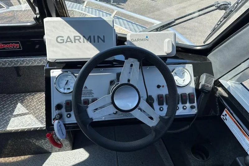 Slide: The Image of 2021 Thunder Jet Skeena Classic Jet dashboard with Garmin navigation system. - 6