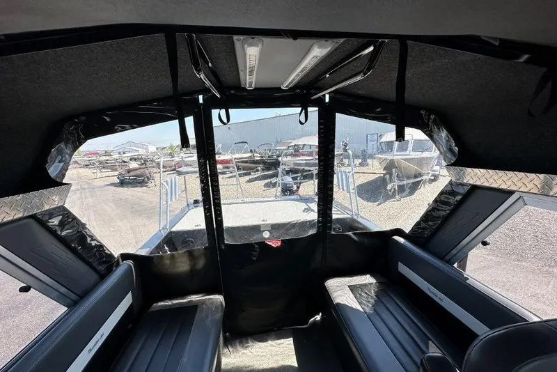 Slide: The Image of Interior view of 2021 Thunder Jet Skeena Classic Jet boat with seating and windows. - 7