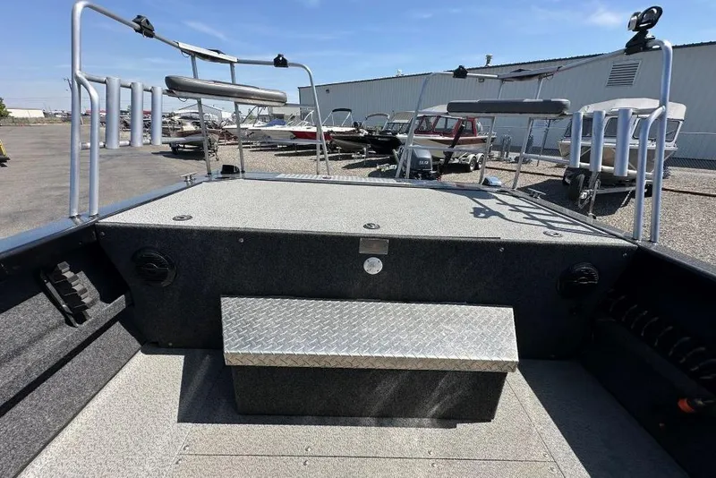 Slide: The Image of 2021 Thunder Jet Skeena Classic Jet boat interior with fishing rod holders and seating. - 8