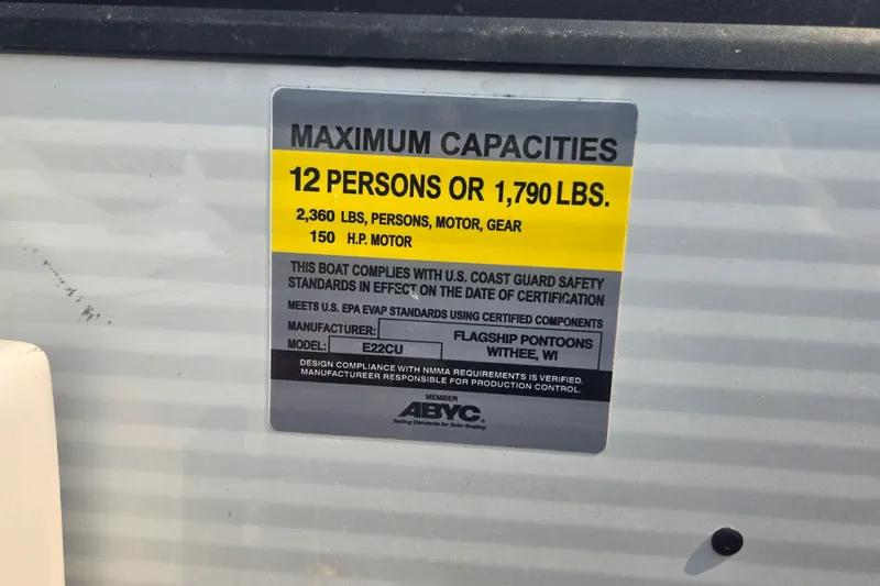 Slide: The Image of 2022 Flagship Pontoon E22CU capacity label: 12 persons or 1,790 lbs, 150 HP motor. - 6