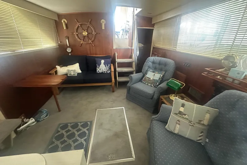 Slide: The Image of Interior of 1971 Chris-Craft Commander 42 yacht with nautical decor and cozy seating. - 39