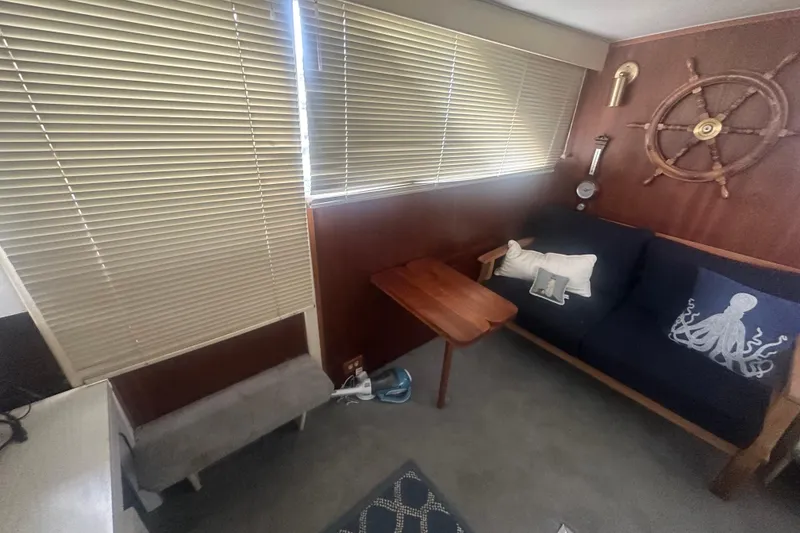 Slide: The Image of Interior of 1971 Chris-Craft Commander 42 with nautical decor and wooden accents. - 40