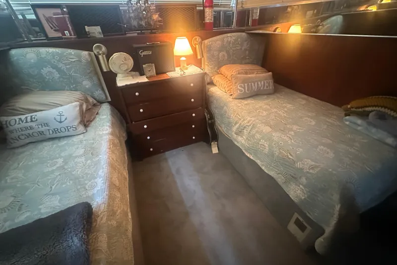 Slide: The Image of 1971 Chris-Craft Commander 42 cabin interior with twin beds and nautical decor. - 43