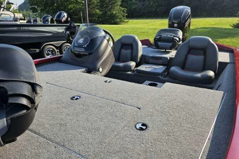 Slide: The Image of 2023 Bass Tracker 195 XTE boat with spacious seating and modern design. - 3