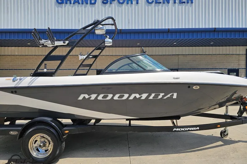 Slide: The Image of 2014 Moomba Outback V boat displayed at Grand Sport Center. - 3