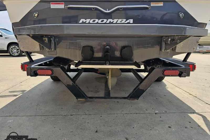 Slide: The Image of Rear view of a 2014 Moomba Outback V boat on a trailer. - 32