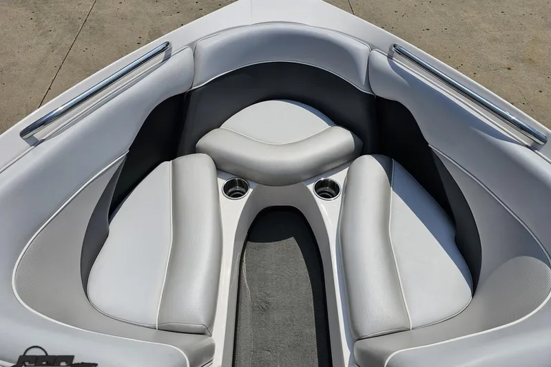 Slide: The Image of 2014 Moomba Outback V boat interior with gray seating and cup holders. - 70
