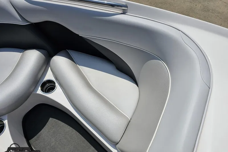 Slide: The Image of 2014 Moomba Outback V boat interior with gray seating and cup holders. - 71