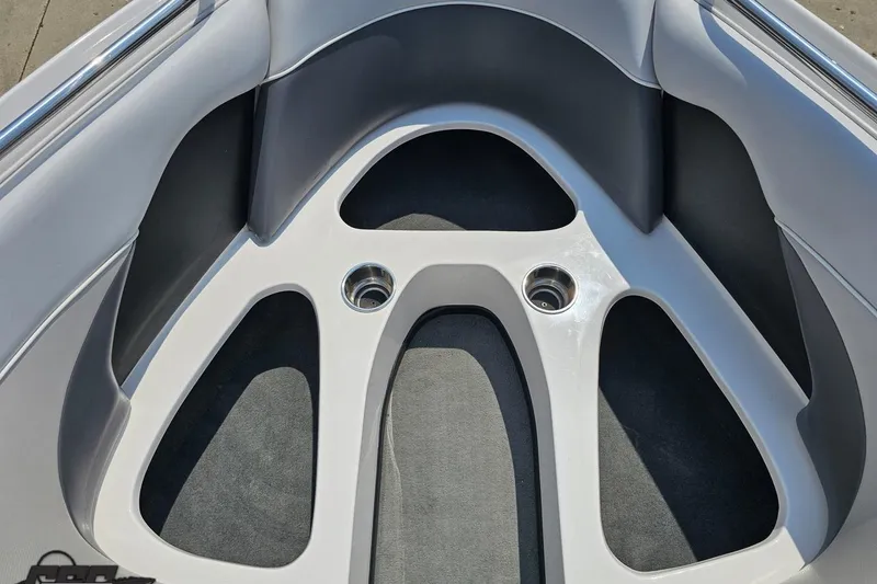 Slide: The Image of 2014 Moomba Outback V boat interior with cup holders and seating area. - 74