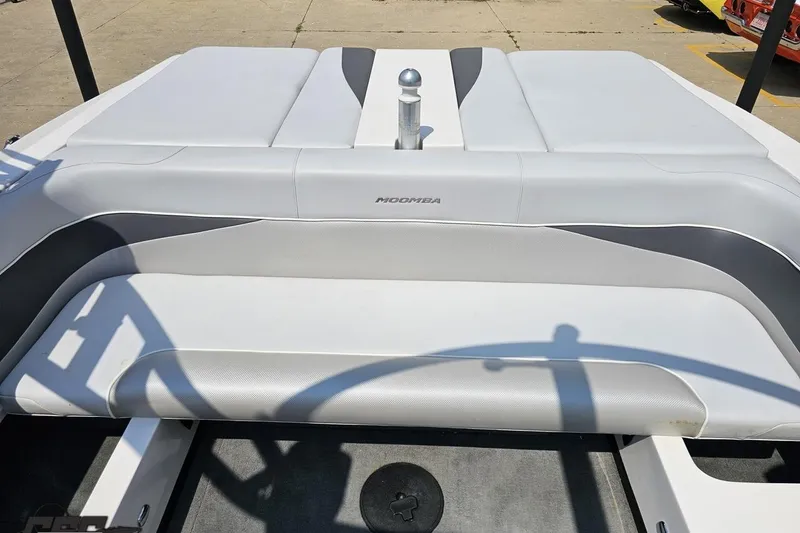 Slide: The Image of 2014 Moomba Outback V boat interior with white and gray seating. - 81