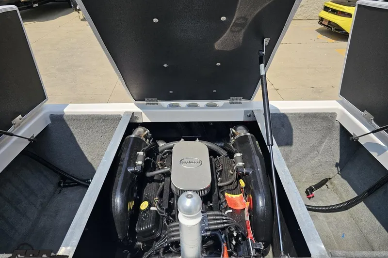 Slide: The Image of 2014 Moomba Outback V engine compartment with open hatch, showcasing the engine details. - 86