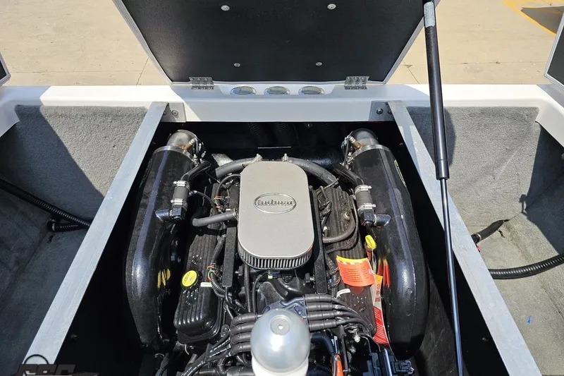 Slide: The Image of 2014 Moomba Outback V engine compartment, showcasing a powerful inboard motor. - 87
