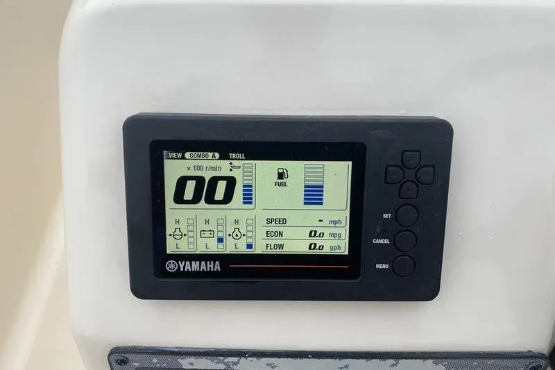 Slide: The Image of Yamaha digital display on 2018 Scout 225 Dorado boat dashboard showing fuel and speed metrics. - 17