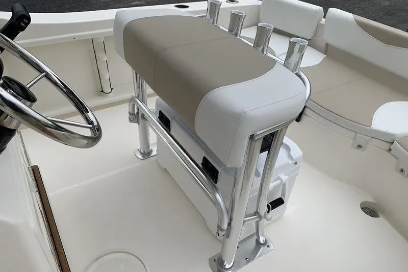 Slide: The Image of 2025 Bulls Bay 200CC boat interior with steering wheel and seating. - 13