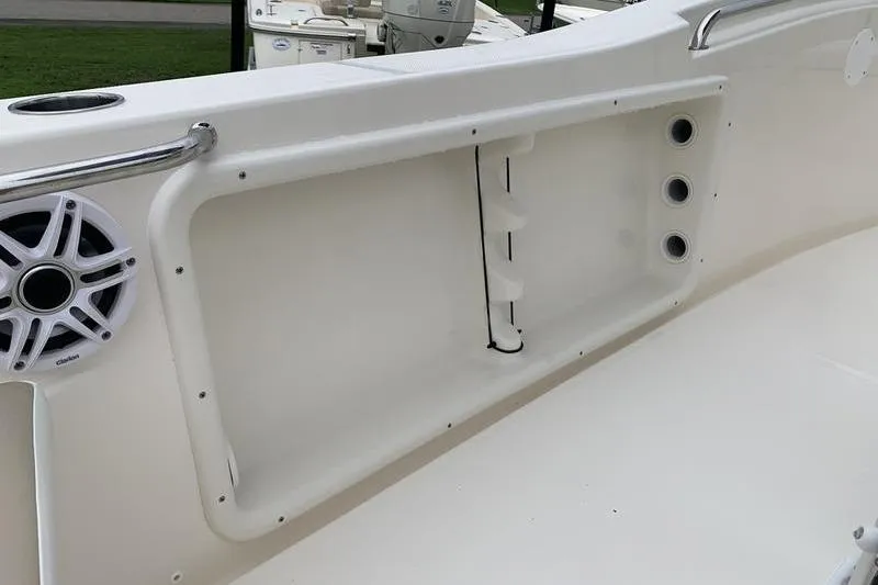 Slide: The Image of 2025 Bulls Bay 200CC boat interior with speaker and storage compartment. - 15