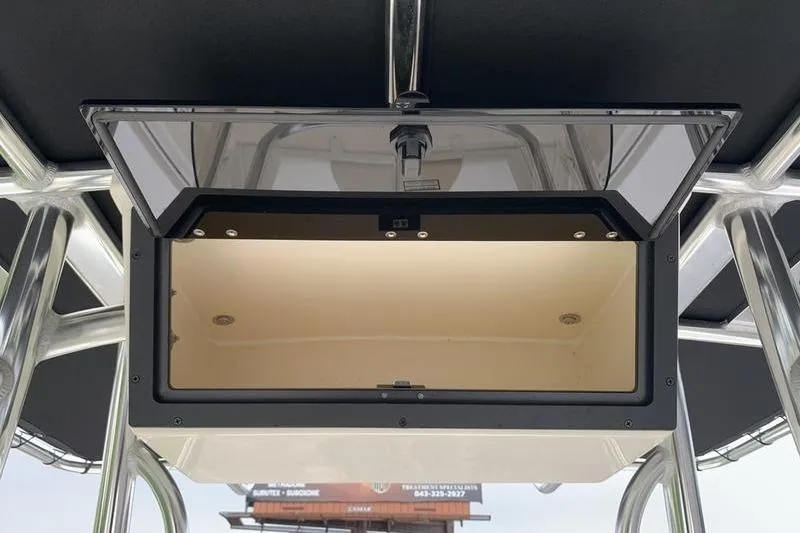 Slide: The Image of Open storage compartment on 2025 Bulls Bay 200CC boat, featuring sleek design and ample space. - 17
