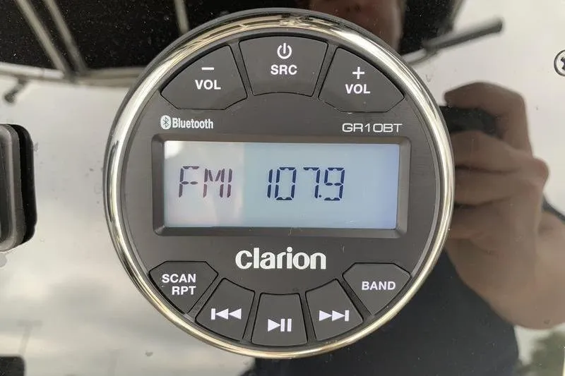 Slide: The Image of Clarion GR10BT radio display showing FM 107.9, installed in a 2025 Bulls Bay 200CC. - 20
