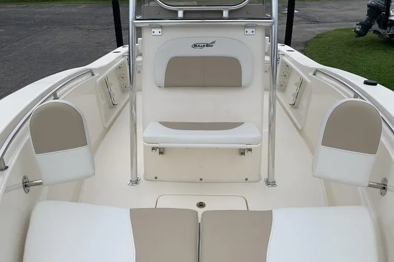 Slide: The Image of 2025 Bulls Bay 200CC boat interior with beige and white seating, showcasing modern design. - 26