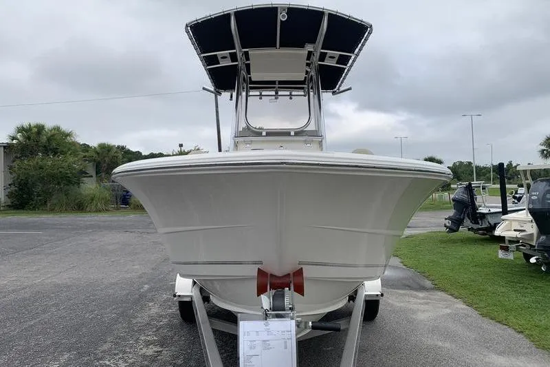 Slide: The Image of 2025 Bulls Bay 200CC boat on trailer, front view, overcast sky. - 7