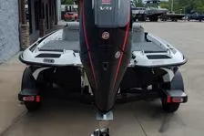 Slide: The Image of 2026 Phoenix 819ZXL boat on trailer, rear view, parked outdoors. - 11