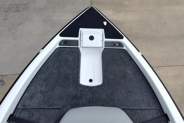 Slide: The Image of Bow of 2026 Phoenix 819ZXL boat with carpeted deck and storage compartments. - 3
