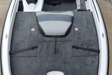 Slide: The Image of 2026 Phoenix 819ZXL boat interior with gray carpet and seating. - 4