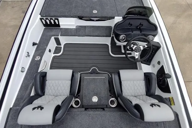 Slide: The Image of 2026 Phoenix 819ZXL boat interior with dual seats, steering wheel, and modern dashboard. - 9