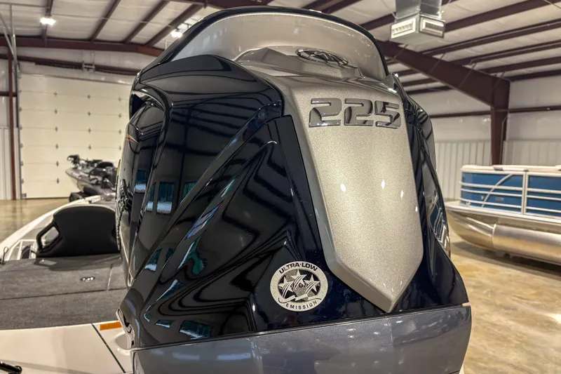 Slide: The Image of Skeeter ZXR 19 boat engine, 225 horsepower, ultra-low emission, in a showroom, 2026 model. - 5