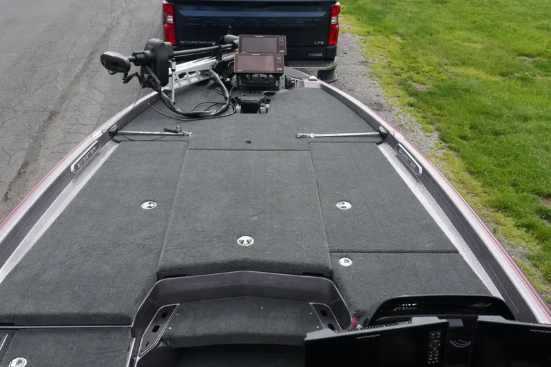 Slide: The Image of 2025 Skeeter FXR20 LE boat deck with advanced fishing equipment and spacious layout. - 10