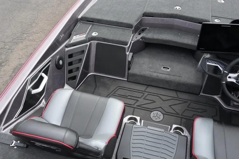 Slide: The Image of 2025 Skeeter FXR20 LE boat interior with sleek seating and modern dashboard design. - 12
