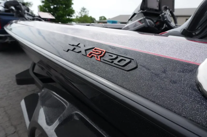 Slide: The Image of 2025 Skeeter FXR20 LE boat, close-up of sleek design and logo detailing. - 4
