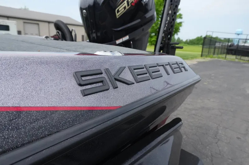 Slide: The Image of 2025 Skeeter FXR20 LE boat close-up, showcasing sleek design and branding. - 5
