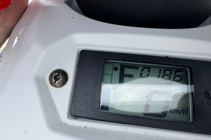 Slide: The Image of Close-up of 2020 Yamaha WaveRunner EX Deluxe dashboard display showing 186 hours. - 7