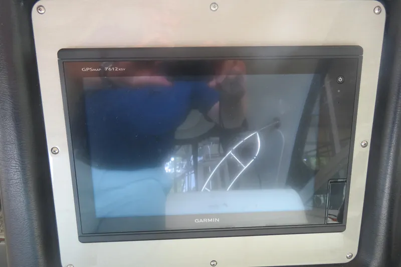 Slide: The Image of Garmin GPSMAP 7612xsv on 2007 Cruisers Yachts 420 Express dashboard. - 16