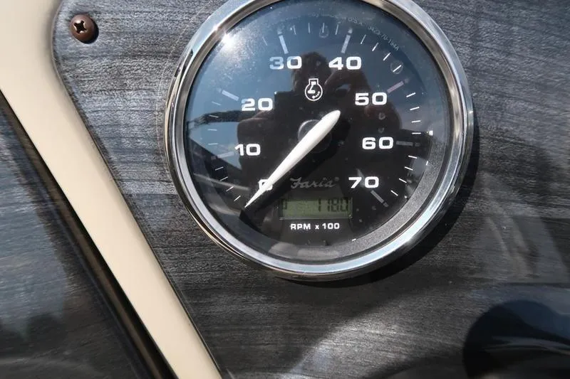 Slide: The Image of Close-up of a 2012 Sweetwater 200 Classic boat tachometer displaying RPM. - 11