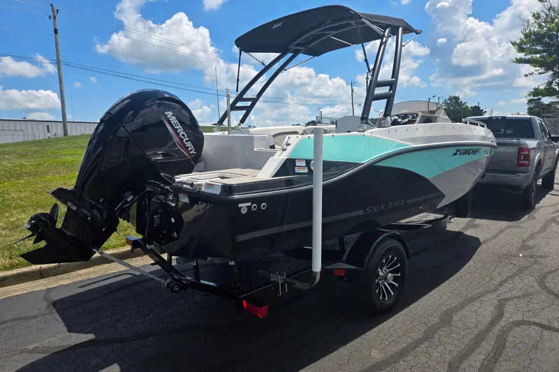 Slide: The Image of 2024 Starcraft SVX 191 OB boat with Mercury outboard motor on trailer. - 3