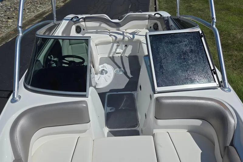 Slide: The Image of 2011 Yamaha Boats AR210 interior with seating and steering wheel, showcasing sleek design. - 20